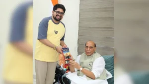 डिजिटल ट्रांसफॉर्मेशन पर डॉ. भार्गव मल्लप्पा की पुस्तक राजनाथ सिंह को भेंट
